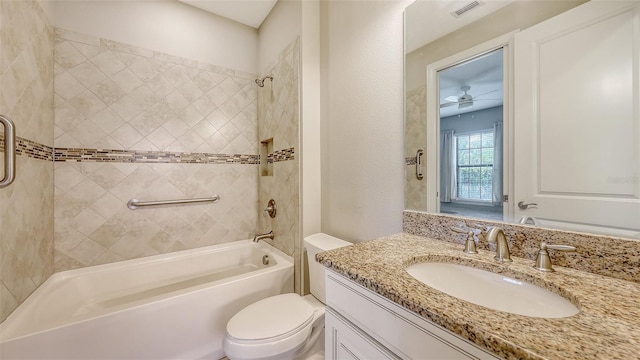 full bathroom featuring shower / tub combination, toilet, vanity, and ceiling fan