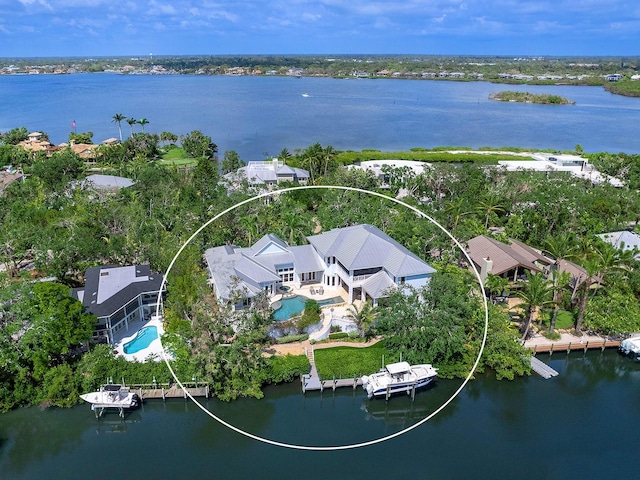 5132 Jungle Plum Rd, Sarasota, FL 34242 - bird's eye view of a pool area and a nearby body of water