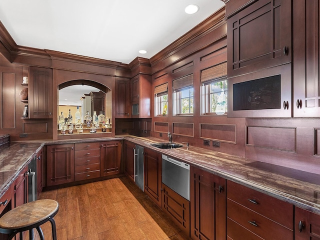 5132 Jungle Plum Rd, Sarasota, FL 34242 - kitchen featuring crown molding, light wood-type flooring, a sink, stainless steel dishwasher, and recessed lighting