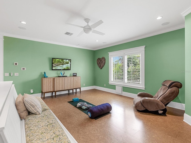 5132 Jungle Plum Rd, Sarasota, FL 34242 - living room with crown molding, tile patterned floors, ceiling fan, baseboards, and recessed lighting