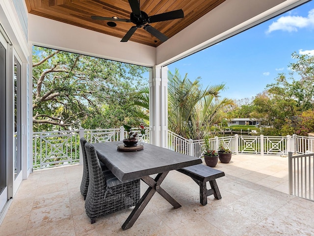 5132 Jungle Plum Rd, Sarasota, FL 34242 - view of patio with a ceiling fan and outdoor dining area