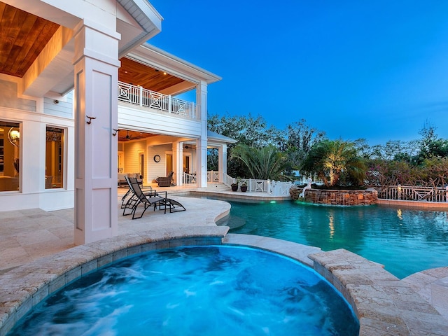 5132 Jungle Plum Rd, Sarasota, FL 34242 - view of pool with a patio area, a pool with connected hot tub, and fence