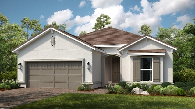 exterior space with driveway, stucco siding, and a garage