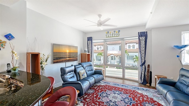 235 Cocoanut Ave Unit 108B, Sarasota, FL 34236 - living area with baseboards, wood finished floors, ceiling fan, and plenty of natural light