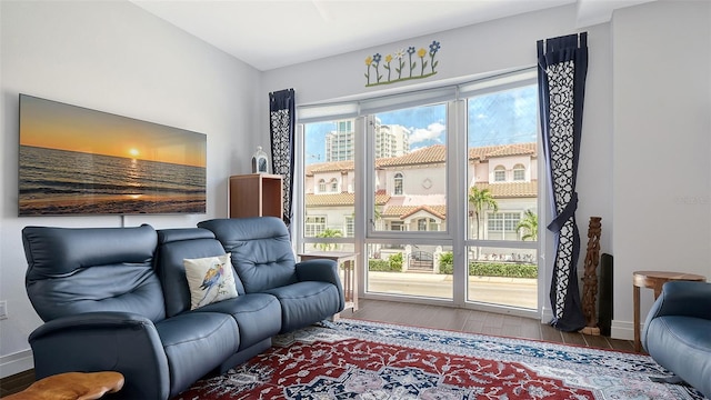 235 Cocoanut Ave Unit 108B, Sarasota, FL 34236 - living room with wood finished floors and baseboards
