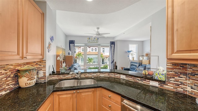 235 Cocoanut Ave Unit 108B, Sarasota, FL 34236 - kitchen featuring a sink, tasteful backsplash, and healthy amount of natural light