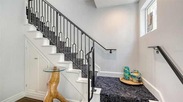 235 Cocoanut Ave Unit 108B, Sarasota, FL 34236 - stairs featuring baseboards