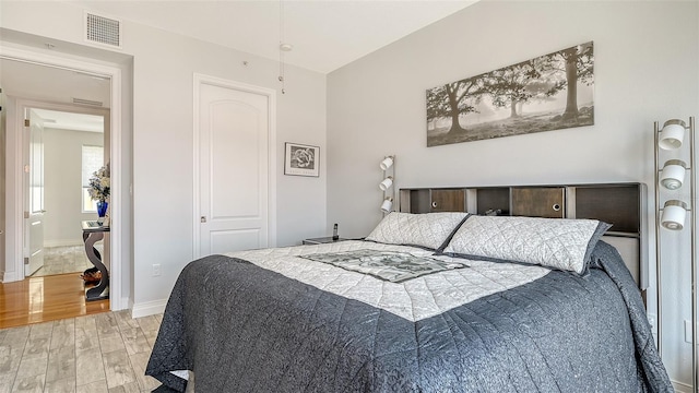 235 Cocoanut Ave Unit 108B, Sarasota, FL 34236 - bedroom with light wood-style flooring and baseboards