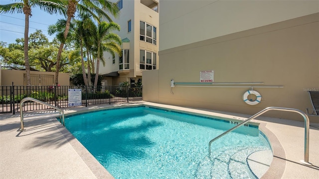 235 Cocoanut Ave Unit 108B, Sarasota, FL 34236 - view of swimming pool featuring fence and a swimming pool