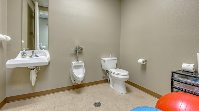 235 Cocoanut Ave Unit 108B, Sarasota, FL 34236 - bathroom with toilet, baseboards, and tile patterned flooring