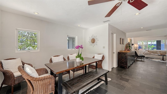 dining area with a ceiling fan and recessed lighting