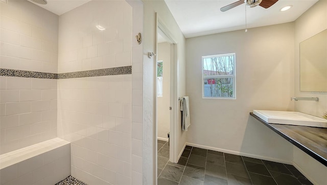 full bath with a ceiling fan, tiled shower, tile patterned flooring, recessed lighting, and baseboards