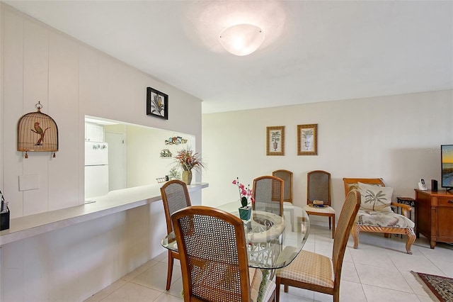 3705 S School Ave Unit 3, Sarasota, FL 34239 - dining room featuring light tile patterned floors