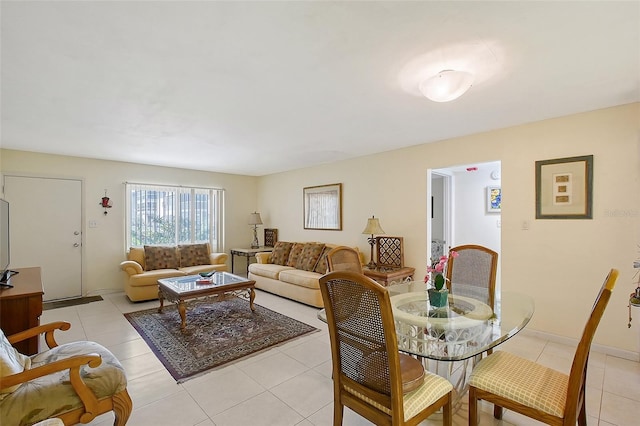 3705 S School Ave Unit 3, Sarasota, FL 34239 - living area with light tile patterned flooring and baseboards
