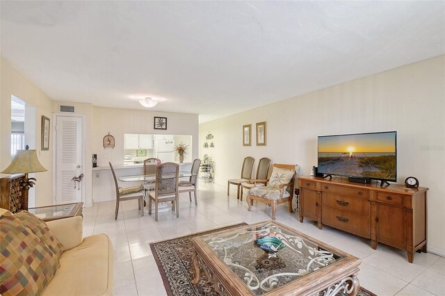3705 S School Ave Unit 3, Sarasota, FL 34239 - living area featuring light tile patterned floors