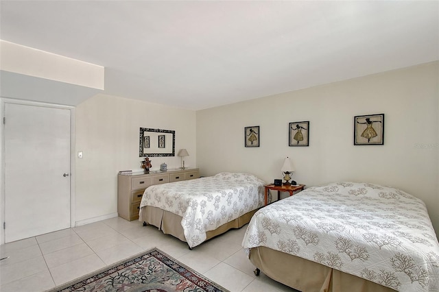 3705 S School Ave Unit 3, Sarasota, FL 34239 - bedroom with light tile patterned floors