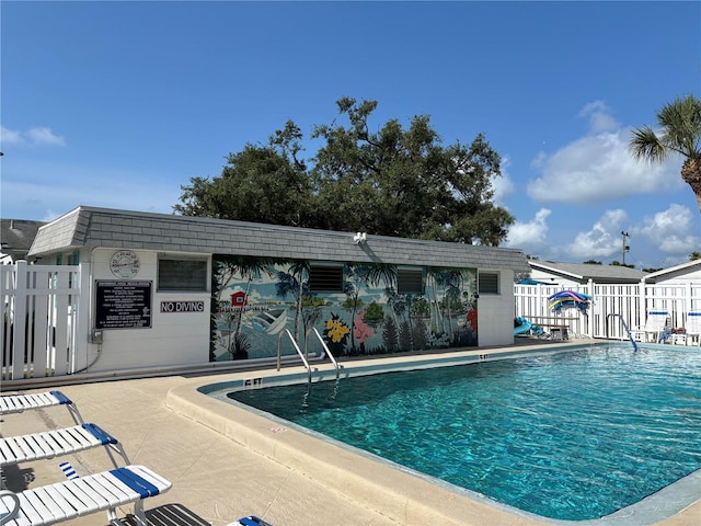 community pool with fence