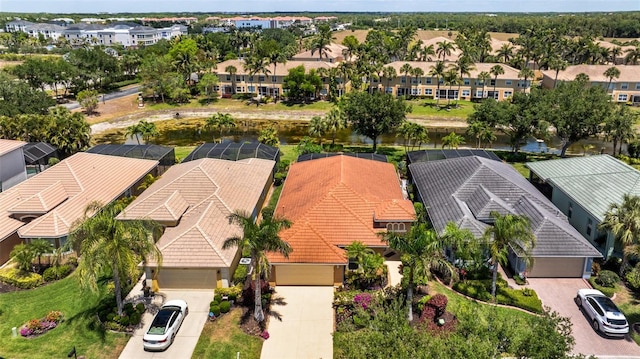 20040 Rookery Dr, Estero, FL 33928 - aerial perspective of suburban area featuring a large body of water