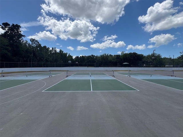 20040 Rookery Dr, Estero, FL 33928 - view of tennis court featuring community basketball court and fence