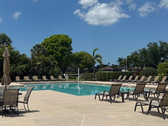 20040 Rookery Dr, Estero, FL 33928 - community pool with a patio area