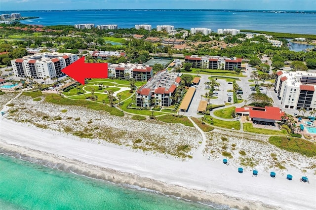 drone / aerial view of expansive beach and apartment complex