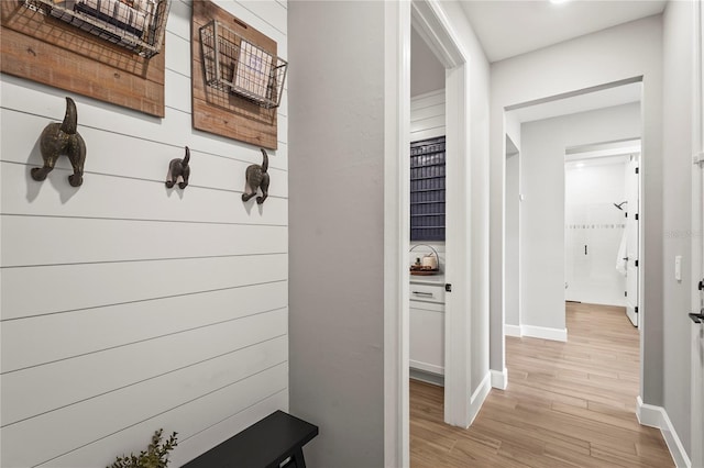 16226 Hidden Oak Loop, Bradenton, FL 34211 - mudroom featuring light wood-type flooring and baseboards
