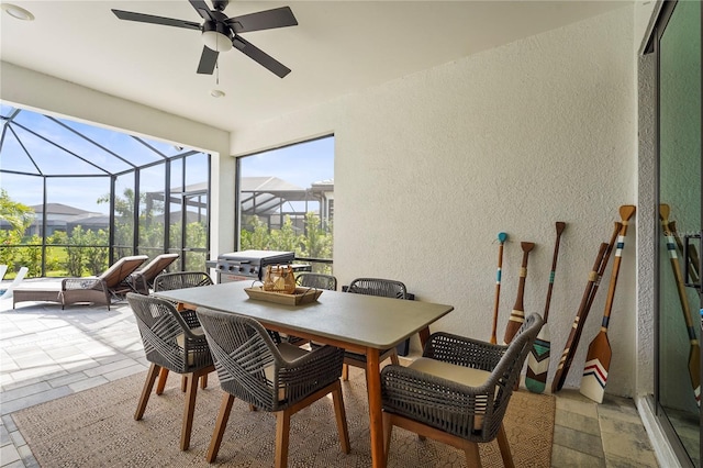 16226 Hidden Oak Loop, Bradenton, FL 34211 - sunroom with ceiling fan and outdoor dining area
