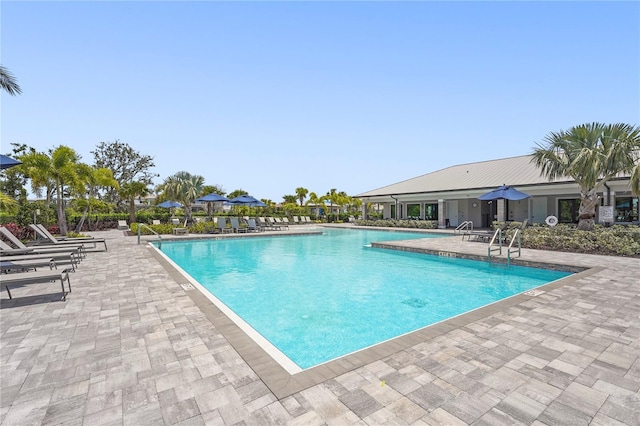 16226 Hidden Oak Loop, Bradenton, FL 34211 - community pool with a patio