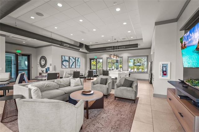 16226 Hidden Oak Loop, Bradenton, FL 34211 - living area featuring light tile patterned flooring, recessed lighting, and baseboards