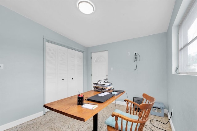 6628 Auburn Ave, Bradenton, FL 34207 - home office with speckle patterned floor and baseboards