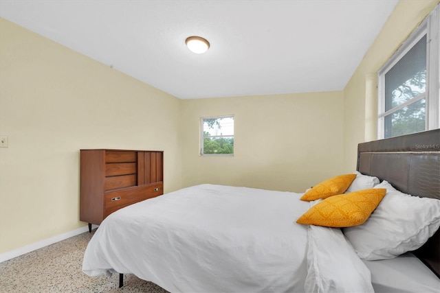 6628 Auburn Ave, Bradenton, FL 34207 - bedroom with speckle patterned floor and baseboards