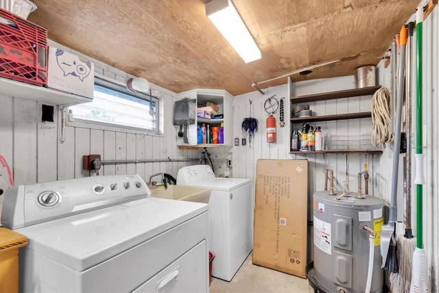 6628 Auburn Ave, Bradenton, FL 34207 - clothes washing area with water heater and independent washer and dryer