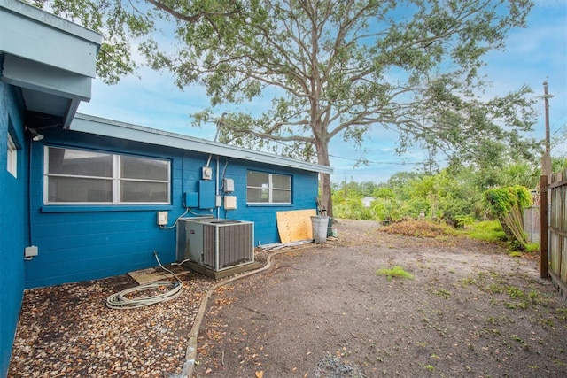 6628 Auburn Ave, Bradenton, FL 34207 - view of front of property featuring cooling unit, fence, and concrete block siding