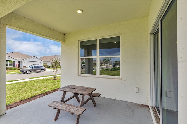 view of patio / terrace with a residential view