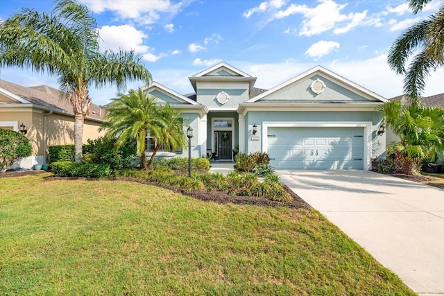 11508 Griffith Park Ter, Bradenton, FL 34211 - ranch-style house with driveway, a garage, a front yard, and stucco siding