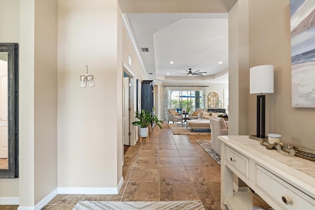 11508 Griffith Park Ter, Bradenton, FL 34211 - hallway with a raised ceiling, recessed lighting, and baseboards
