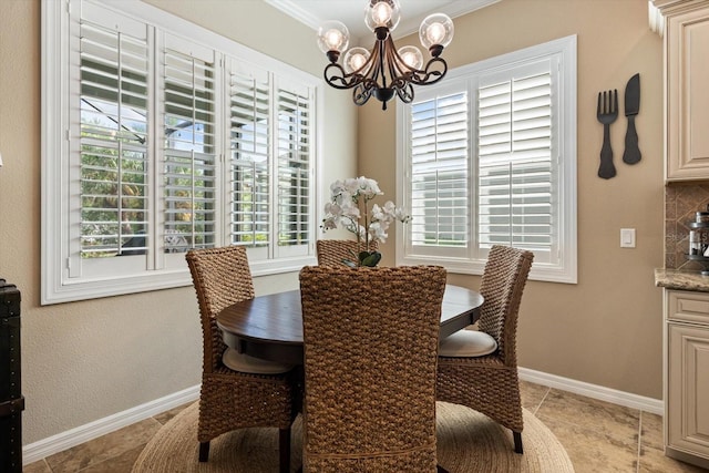 11508 Griffith Park Ter, Bradenton, FL 34211 - dining room featuring a chandelier, baseboards, light tile patterned floors, and ornamental molding