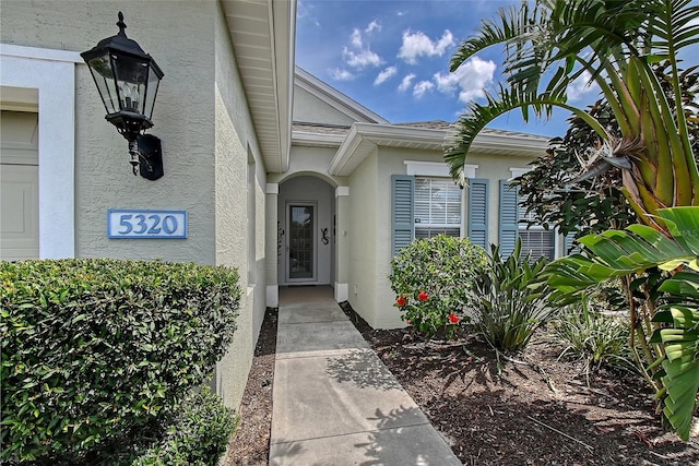 5320 Tide Point Way, Bradenton, FL 34208 - property entrance with stucco siding