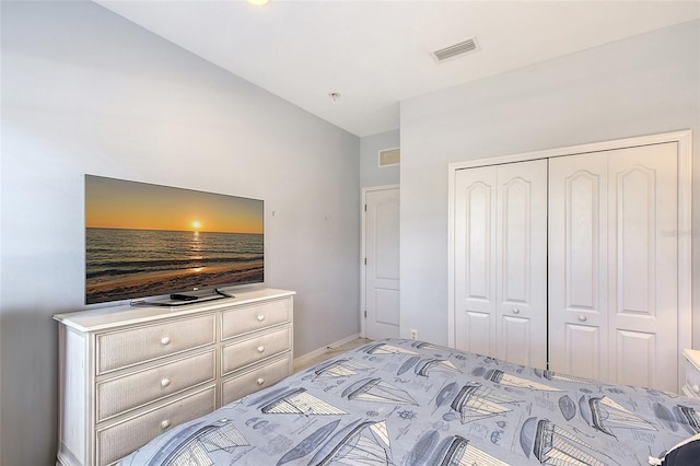 5320 Tide Point Way, Bradenton, FL 34208 - bedroom with baseboards, a closet, and lofted ceiling