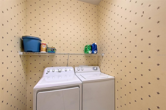 5320 Tide Point Way, Bradenton, FL 34208 - laundry area featuring washing machine and clothes dryer and wallpapered walls