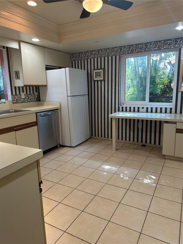 2181 Pine Gardens Trl, Sarasota, FL 34231 - kitchen with ornamental molding, dishwasher, a sink, a ceiling fan, and light countertops