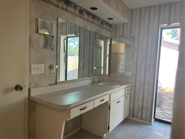 2181 Pine Gardens Trl, Sarasota, FL 34231 - bathroom with vanity and tile patterned floors