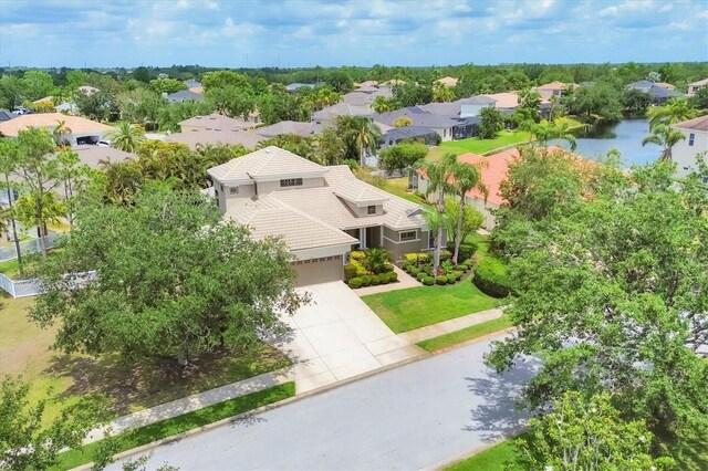 6470 Indigo Bunting Pl, Lakewood Ranch, FL 34202 - aerial view of residential area with a large body of water