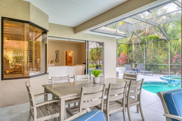 6470 Indigo Bunting Pl, Lakewood Ranch, FL 34202 - view of patio / terrace featuring an in-ground hot tub, an outdoor pool, outdoor dining space, and a lanai