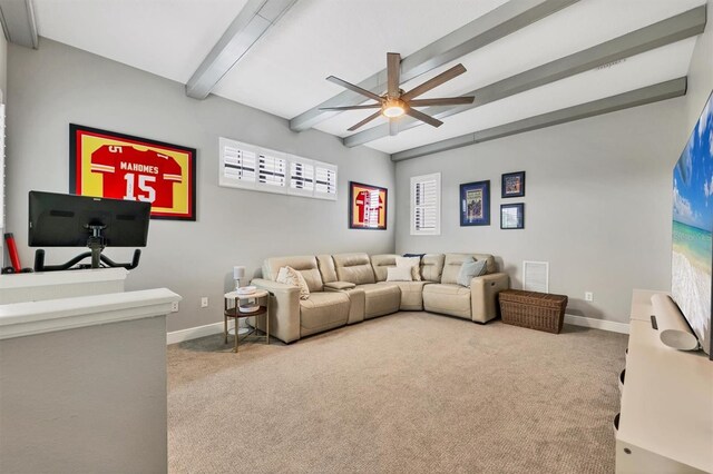6470 Indigo Bunting Pl, Lakewood Ranch, FL 34202 - carpeted living room with beamed ceiling and a ceiling fan