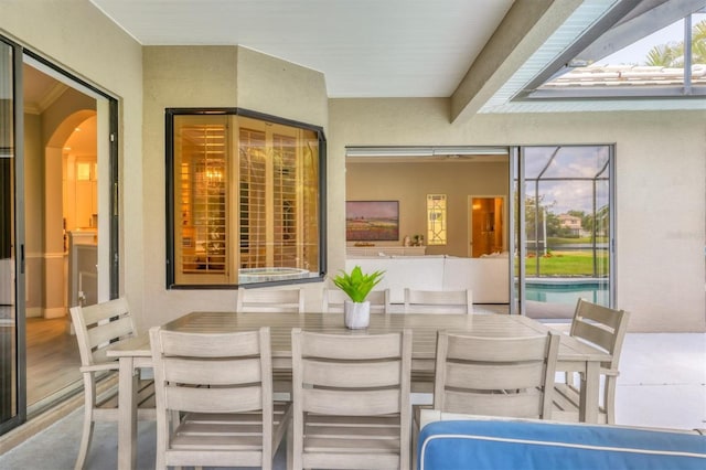 6470 Indigo Bunting Pl, Lakewood Ranch, FL 34202 - view of patio / terrace with outdoor dining area and an outdoor pool