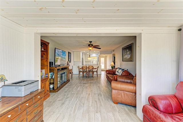 9409 Catalina Dr, Bradenton, FL 34210 - living area with light wood-style floors and ceiling fan