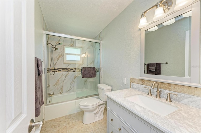 9409 Catalina Dr, Bradenton, FL 34210 - bathroom featuring toilet, enclosed tub / shower combo, vanity, a textured ceiling, and a textured wall