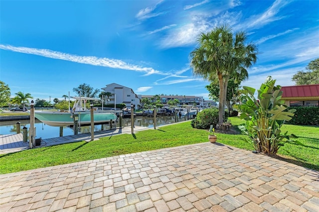 9409 Catalina Dr, Bradenton, FL 34210 - surrounding community with boat lift, a water view, a yard, a dock, and a patio