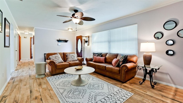 1010 68th St NW, Bradenton, FL 34209 - living area with a ceiling fan, light wood-style flooring, ornamental molding, and baseboards